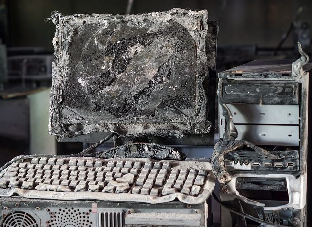 Personal computer burnt due to electricity short circuit - Threat to computer hardware concept